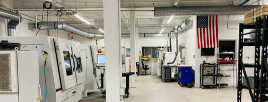 Why Made In USA Matters: Zootility a Case Study Seen with US Flag on Wall